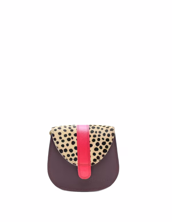 Dark purple animal print recycled leather small saddle crossbody bag by Soruka
