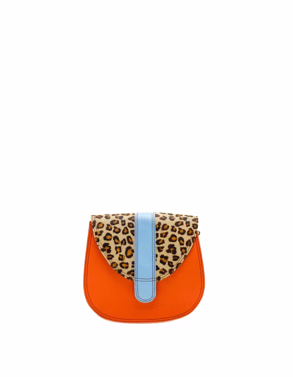 Orange animal print recycled leather small saddle crossbody bag by Soruka